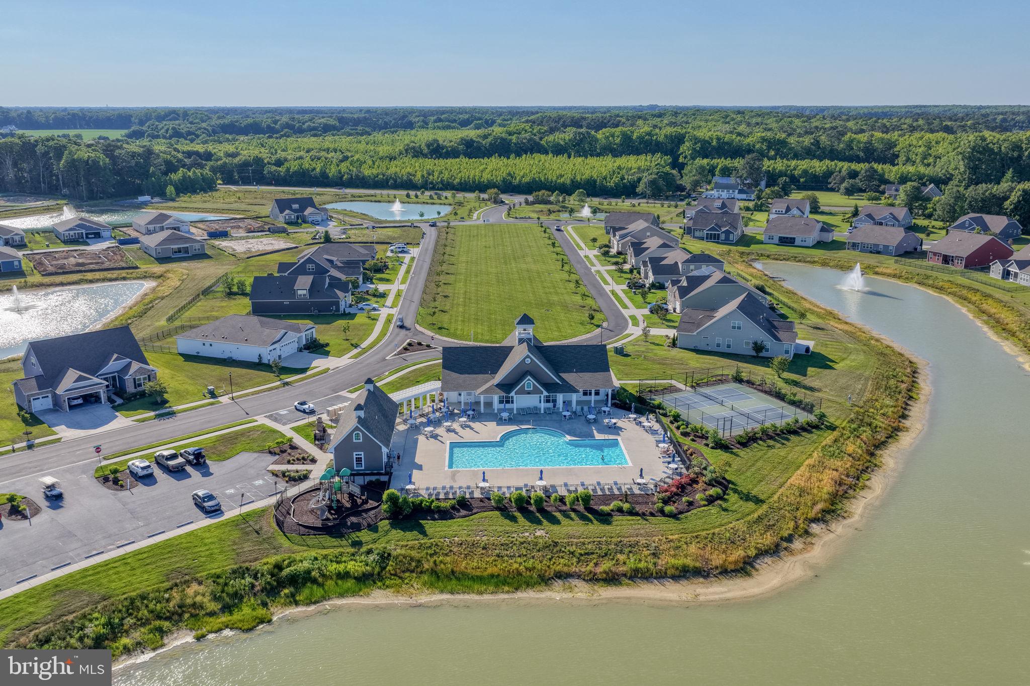 15272 Crape Myrtle Road Milton, DE 19968 - Photo 14 of 61 Serene community with scenic poolside.