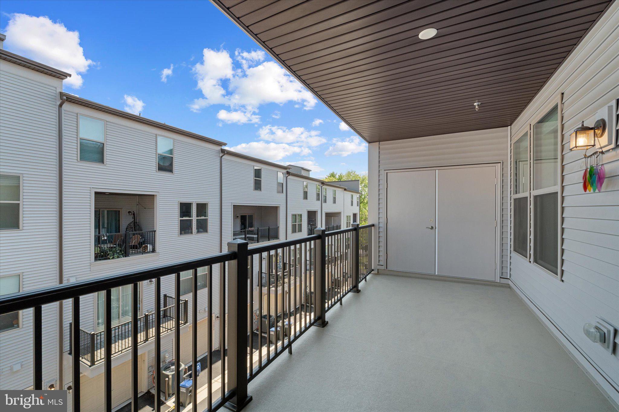 13695 Innovation Station Loop, Unit 77B Herndon, VA 20171 - Photo 13 of 36 Private Balcony with Outdoor Living Space