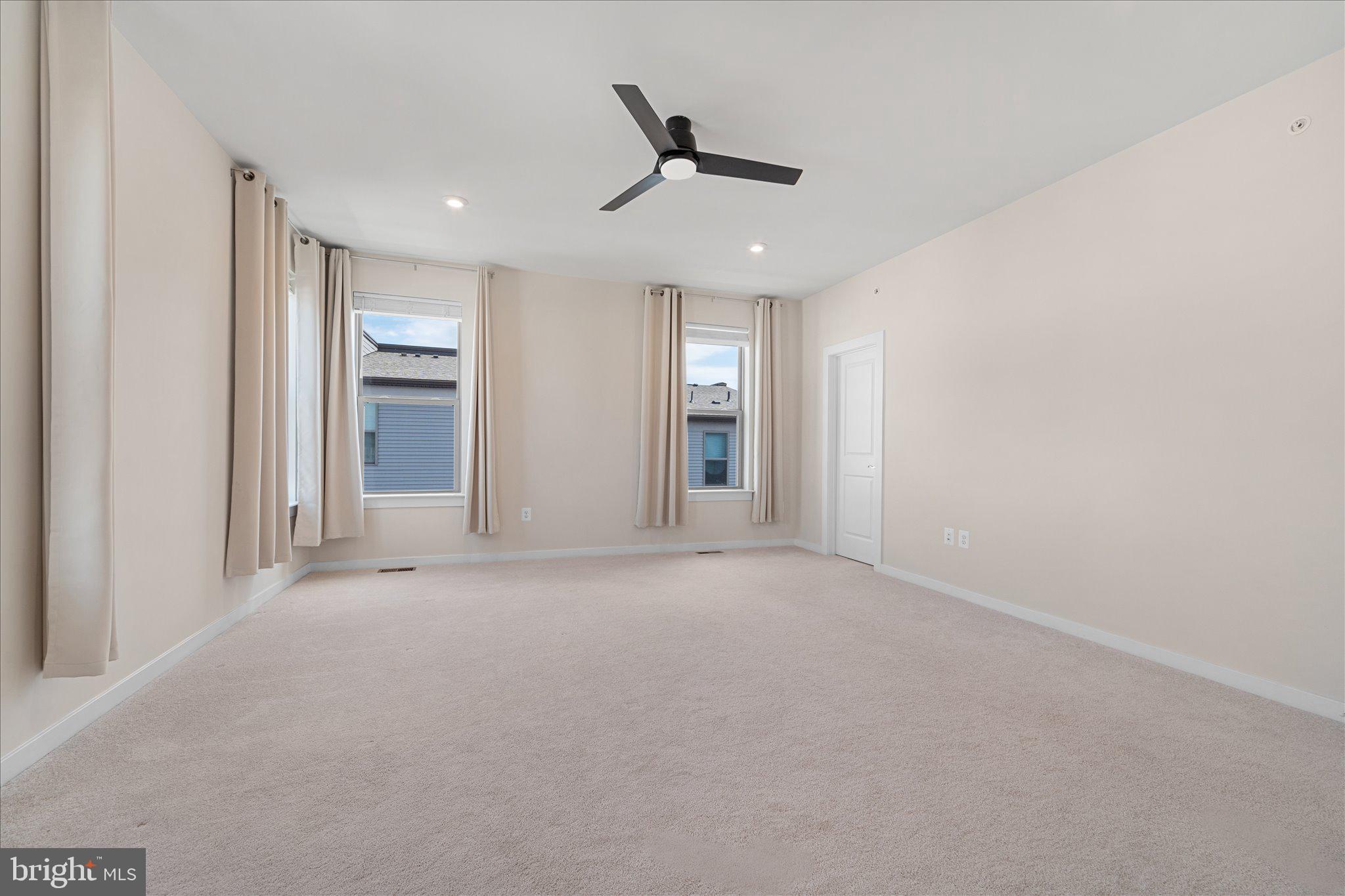 13695 Innovation Station Loop, Unit 77B Herndon, VA 20171 - Photo 15 of 36 Spacious Primary Suite with Natural Light