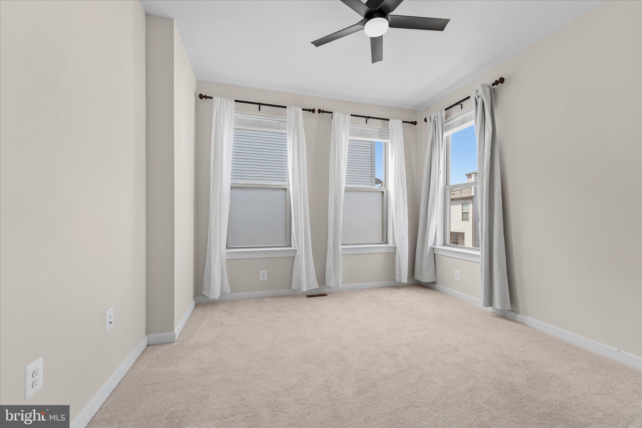 13695 Innovation Station Loop, Unit 77B Herndon, VA 20171 - Photo 22 of 36 Bedroom 1 – Bright with Ample Closet Space