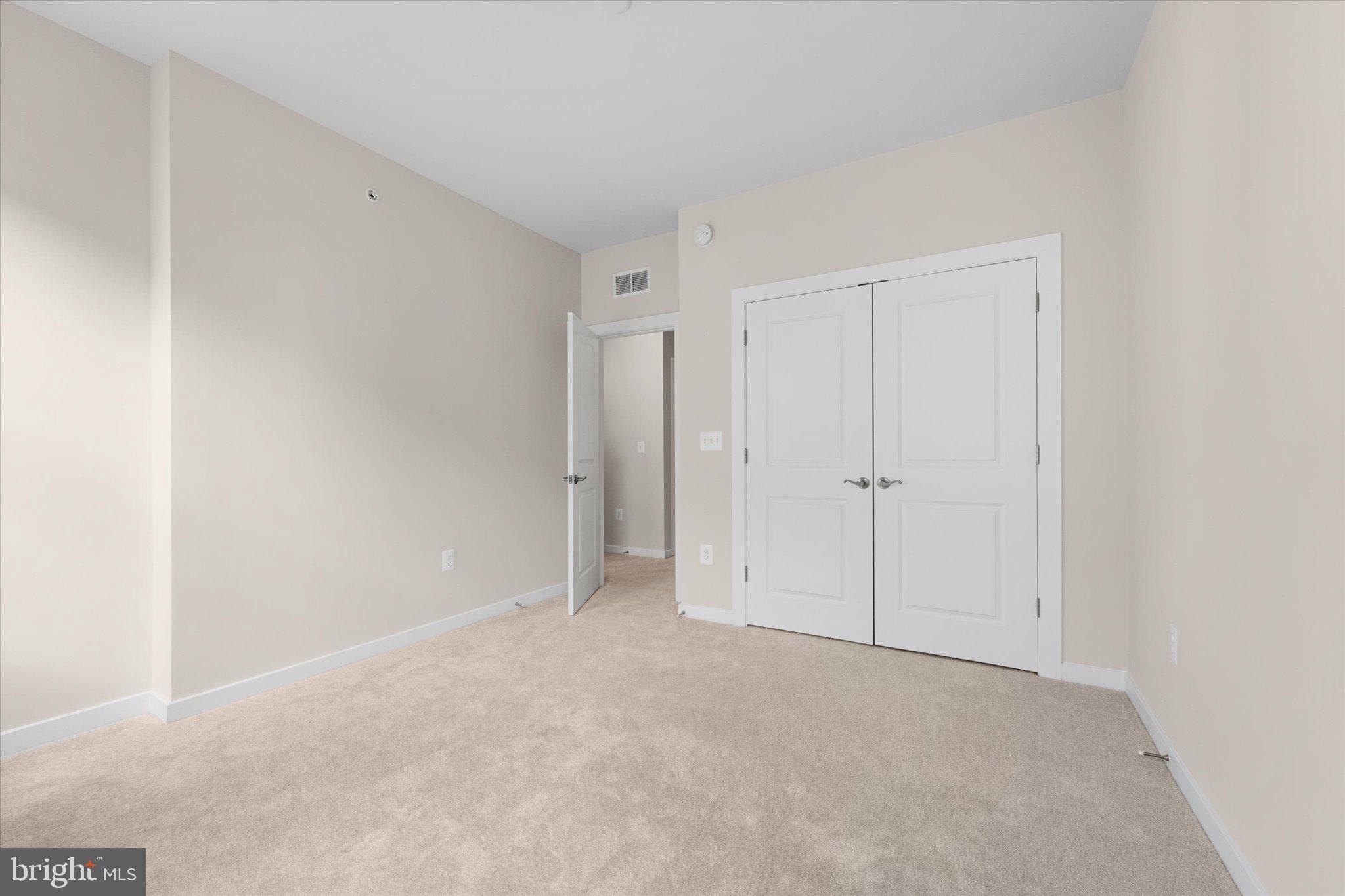 13695 Innovation Station Loop, Unit 77B Herndon, VA 20171 - Photo 25 of 36 Bedroom 2 – Perfect for Guests or Workspace