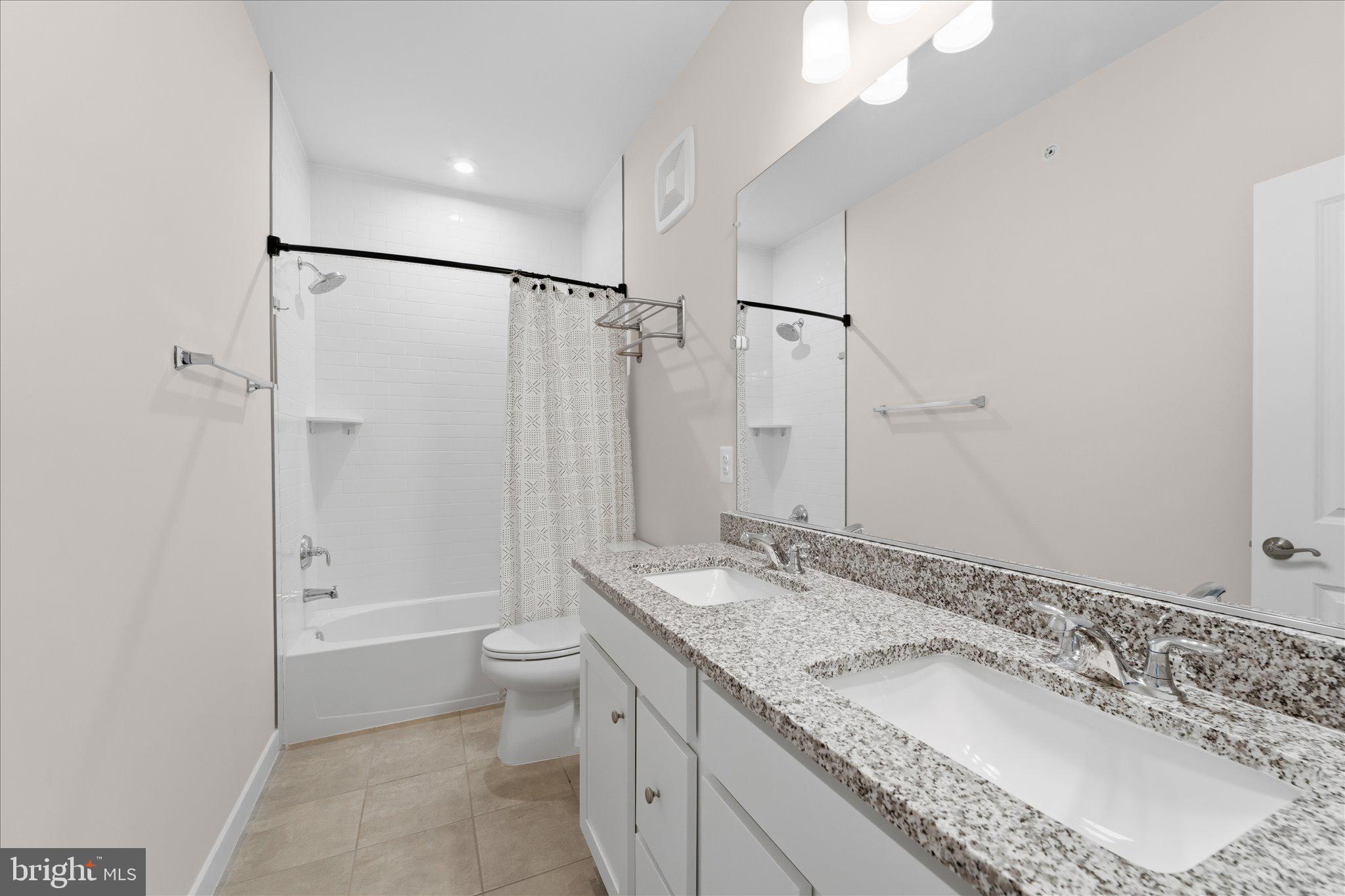 13695 Innovation Station Loop, Unit 77B Herndon, VA 20171 - Photo 27 of 36 Full Bath with Double Vanity & Storage