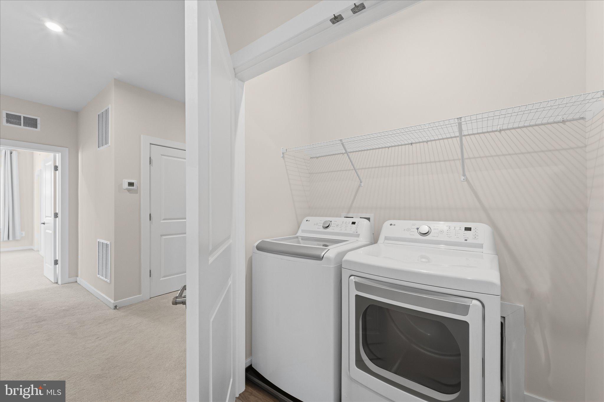 13695 Innovation Station Loop, Unit 77B Herndon, VA 20171 - Photo 28 of 36 Dedicated Laundry Area with Storage