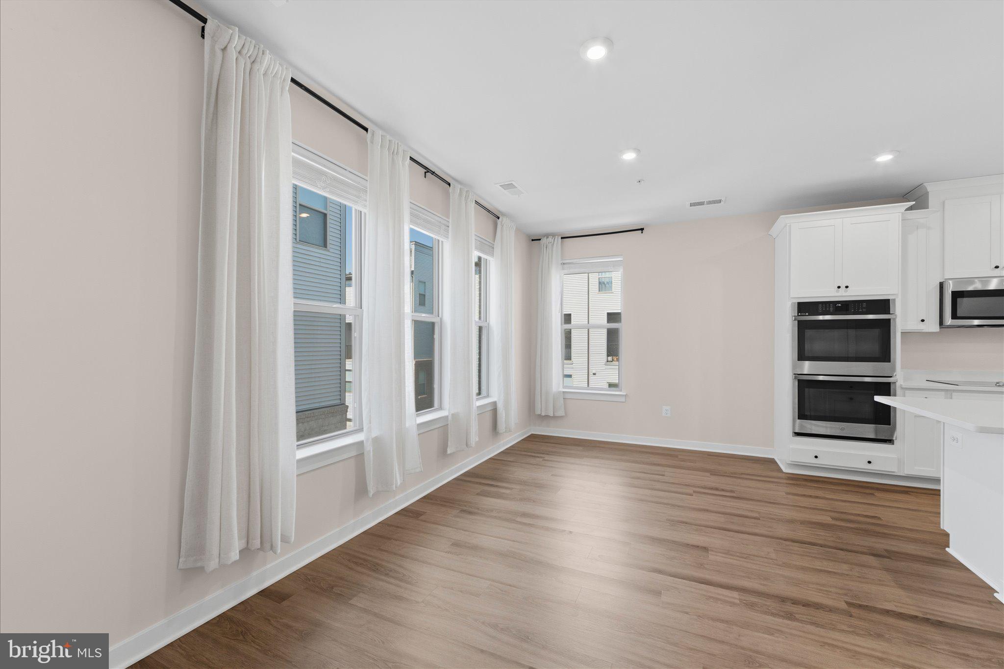 13695 Innovation Station Loop, Unit 77B Herndon, VA 20171 - Photo 6 of 36 Dining Area Adjacent to Kitchen