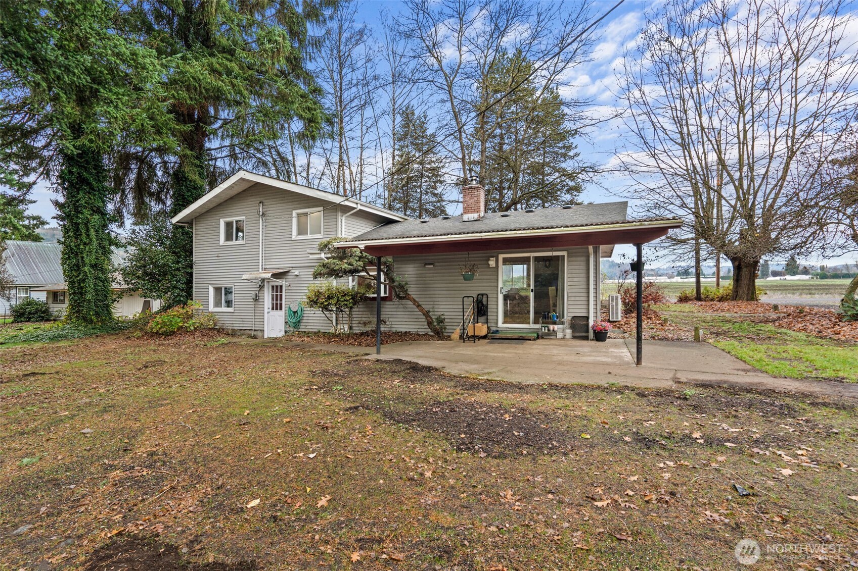 137 Aldrich Road Mossyrock, WA 98564 - Photo 25 of 30 a view of a house with a yard and large tree
