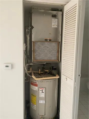a utility room with washer and dryer