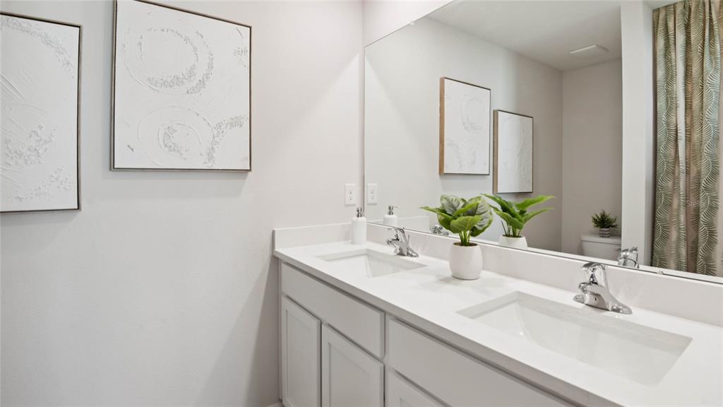 3052 Northeast 21st Ct Road Ocala, FL 34479 - Photo 13 of 21 a bathroom with a sink and a mirror