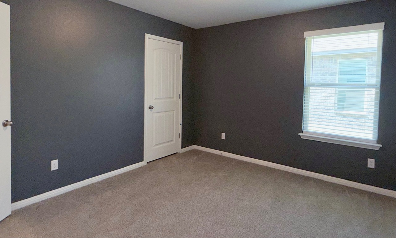 1005 Sundrops Street Leander, TX 78641 - Photo 24 of 39 an empty room with windows