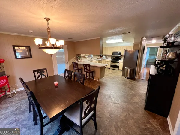 a bathroom with a sink a mirror and a shower