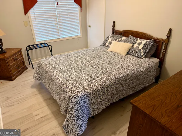 a view of a swimming pool with a lake