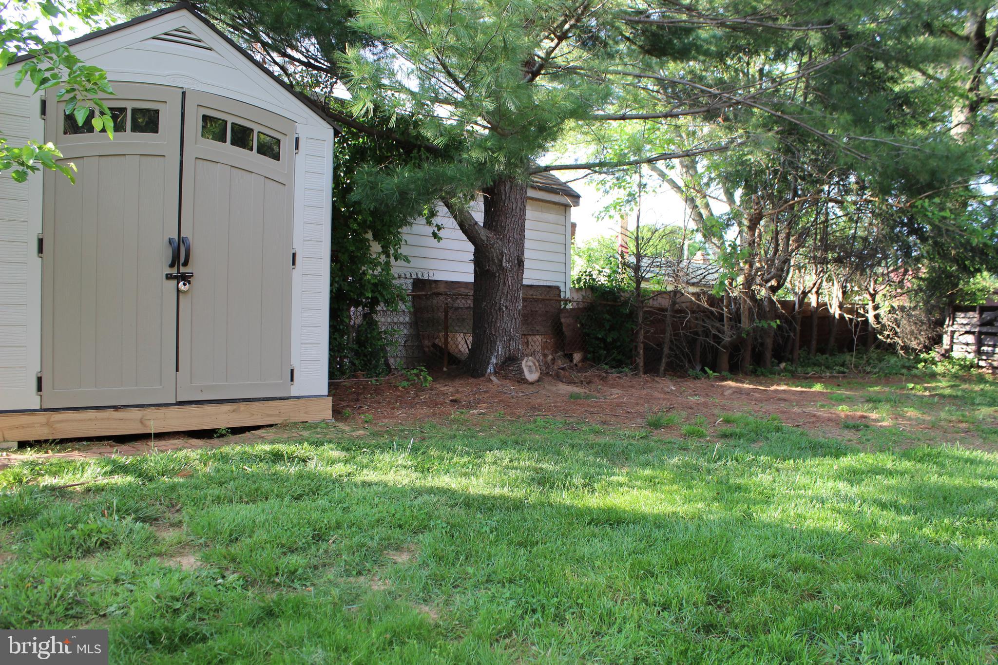 911 Snure Road Silver Spring, MD 20901 - Photo 22 of 24 Back yard with two sheds