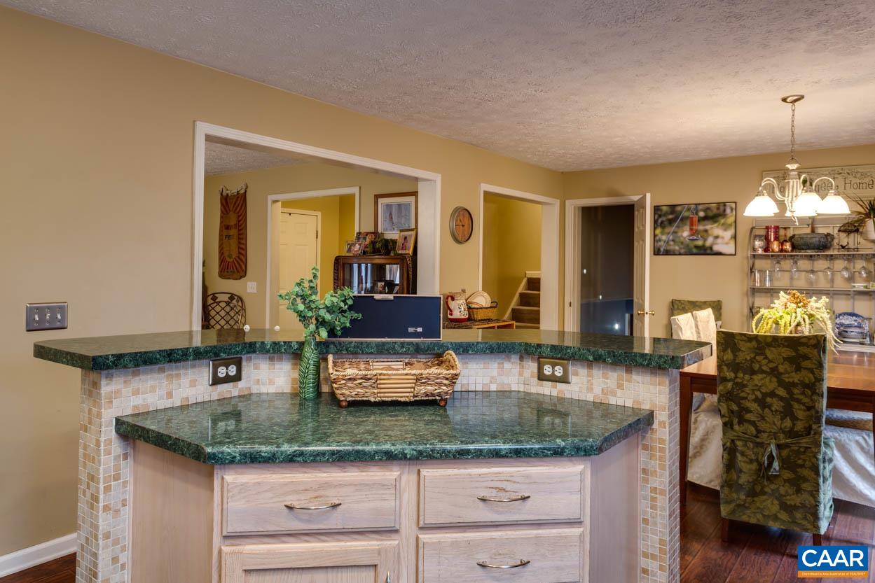 39 Paynes Mill Road Troy, VA 22974 - Photo 18 of 54 a kitchen with granite countertop a sink and cabinets