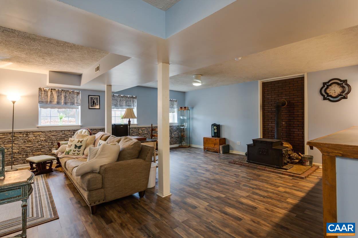 39 Paynes Mill Road Troy, VA 22974 - Photo 32 of 54 a living room with furniture and wooden floor