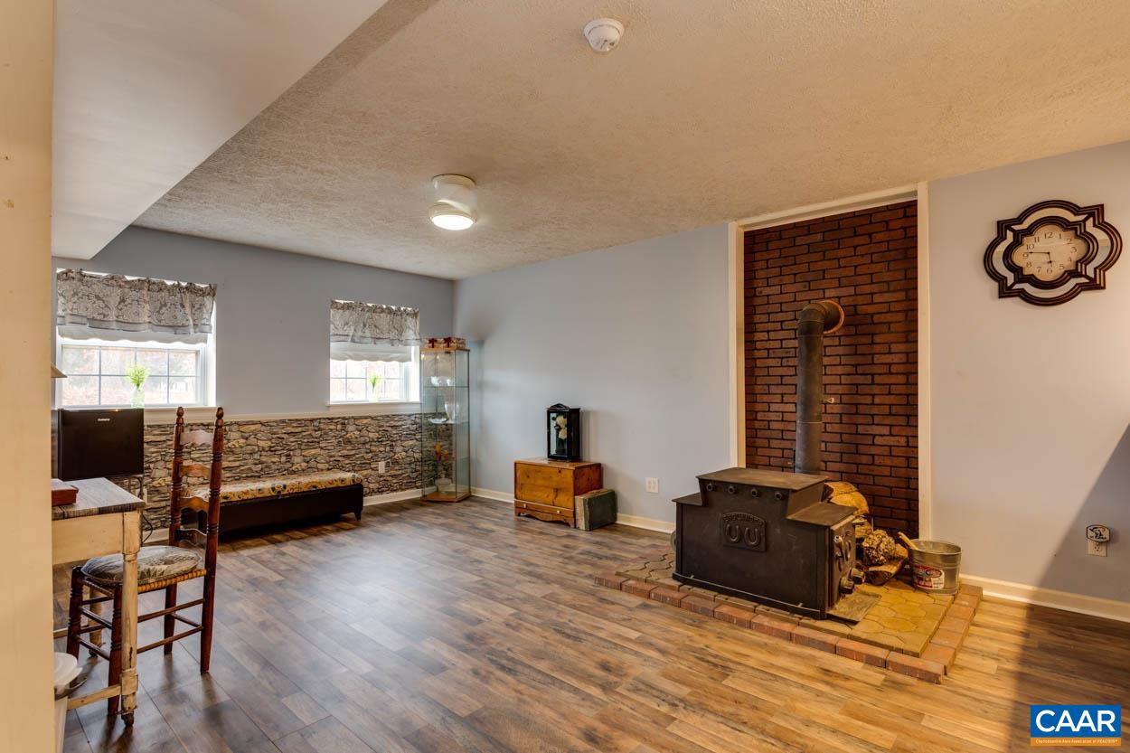 39 Paynes Mill Road Troy, VA 22974 - Photo 33 of 54 a bedroom with furniture and a window