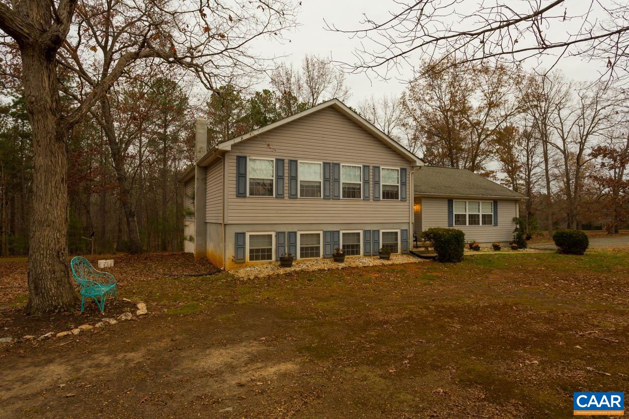 39 Paynes Mill Road Troy, VA 22974 - Photo 4 of 54 a front view of a house with a yard