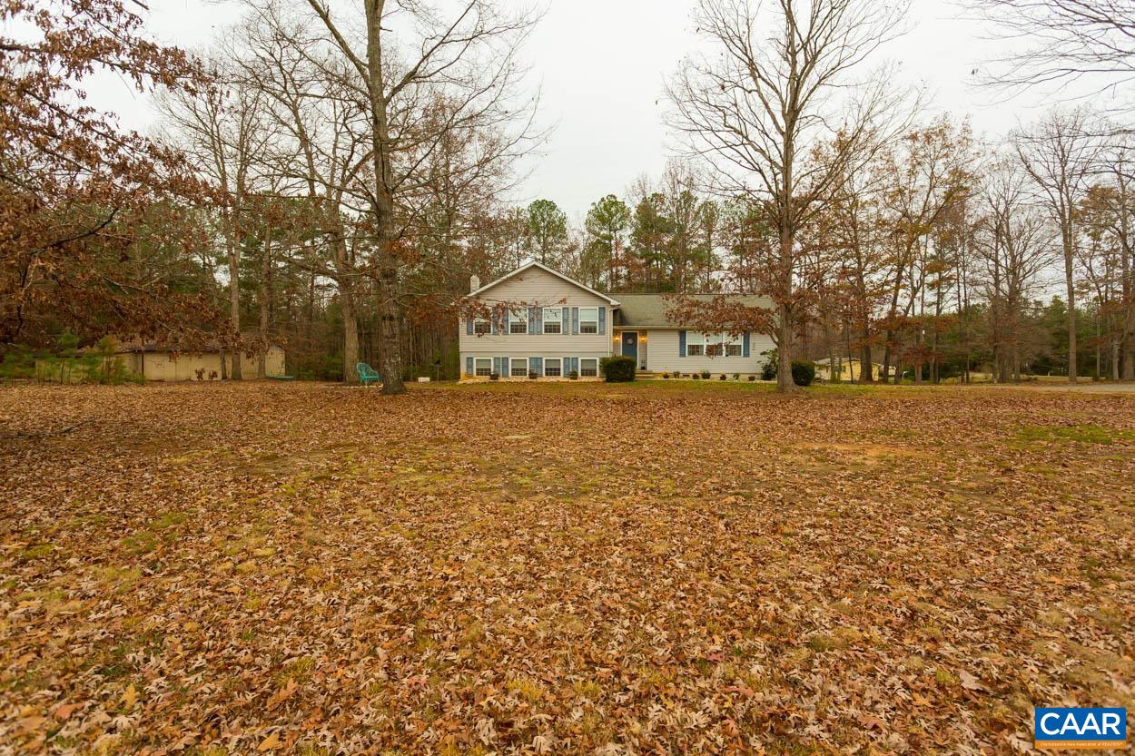 39 Paynes Mill Road Troy, VA 22974 - Photo 41 of 54 a big house with a big yard and large trees