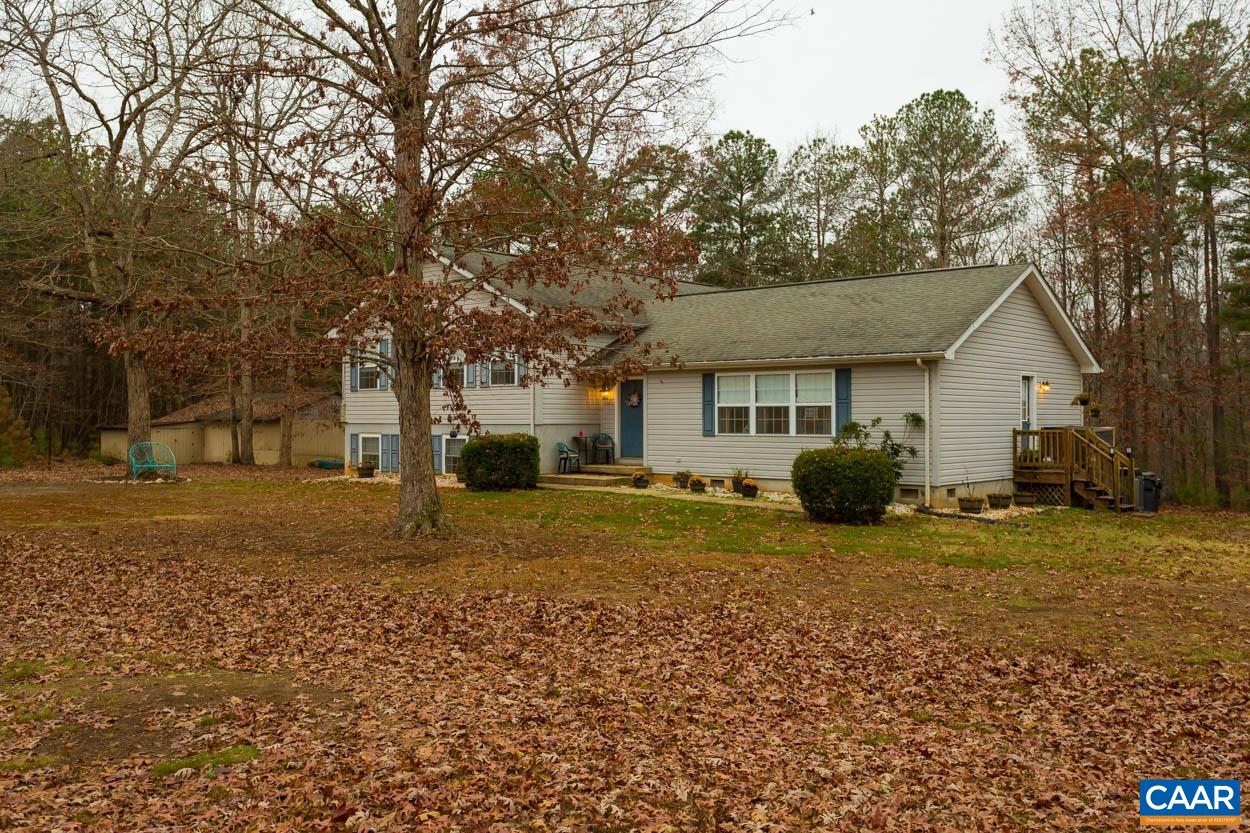 39 Paynes Mill Road Troy, VA 22974 - Photo 44 of 54 a view of a house with a yard and large tree