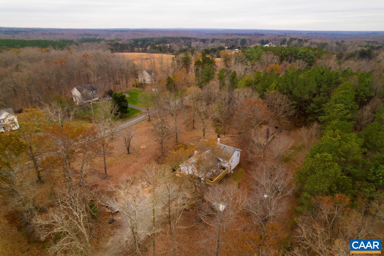 39 Paynes Mill Road Troy, VA 22974 - Photo 53 of 54 a view of a lake with a mountain in the background