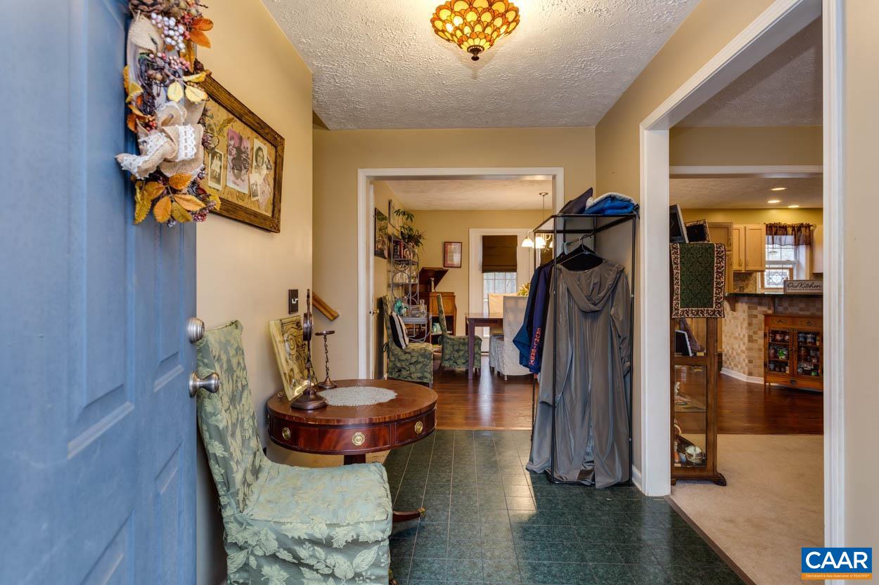 39 Paynes Mill Road Troy, VA 22974 - Photo 10 of 54 a view of a dining room with a table and chairs