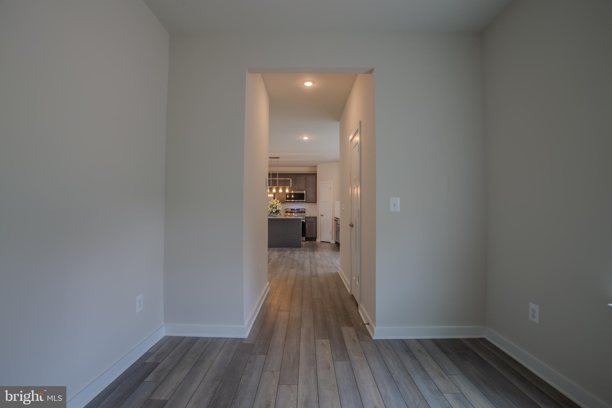503 Boise Road Inwood, WV 25428 - Photo 21 of 83 a view of a hallway view of wooden floor and a living room