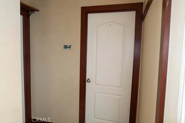 a bathroom with a shower and a door