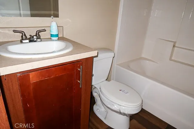 a bathroom with a sink and a toilet