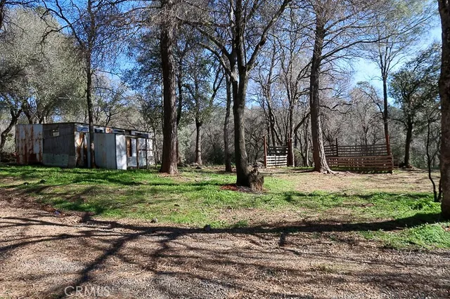 a house with trees in the background