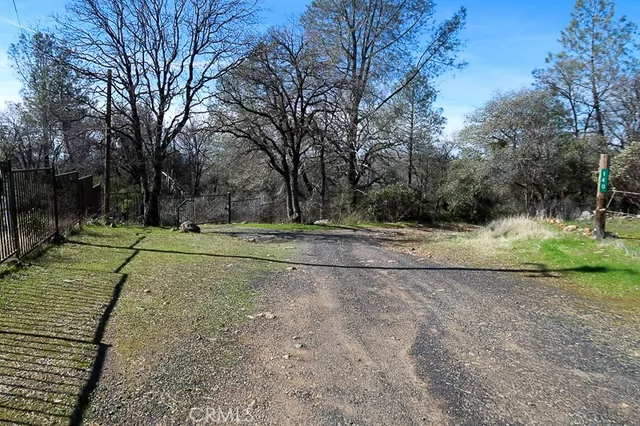 a view of a playground with basketball court