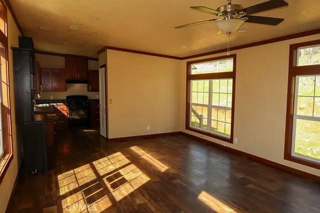 a view of livingroom with furniture and a window