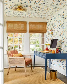 a workspace with furniture and a window