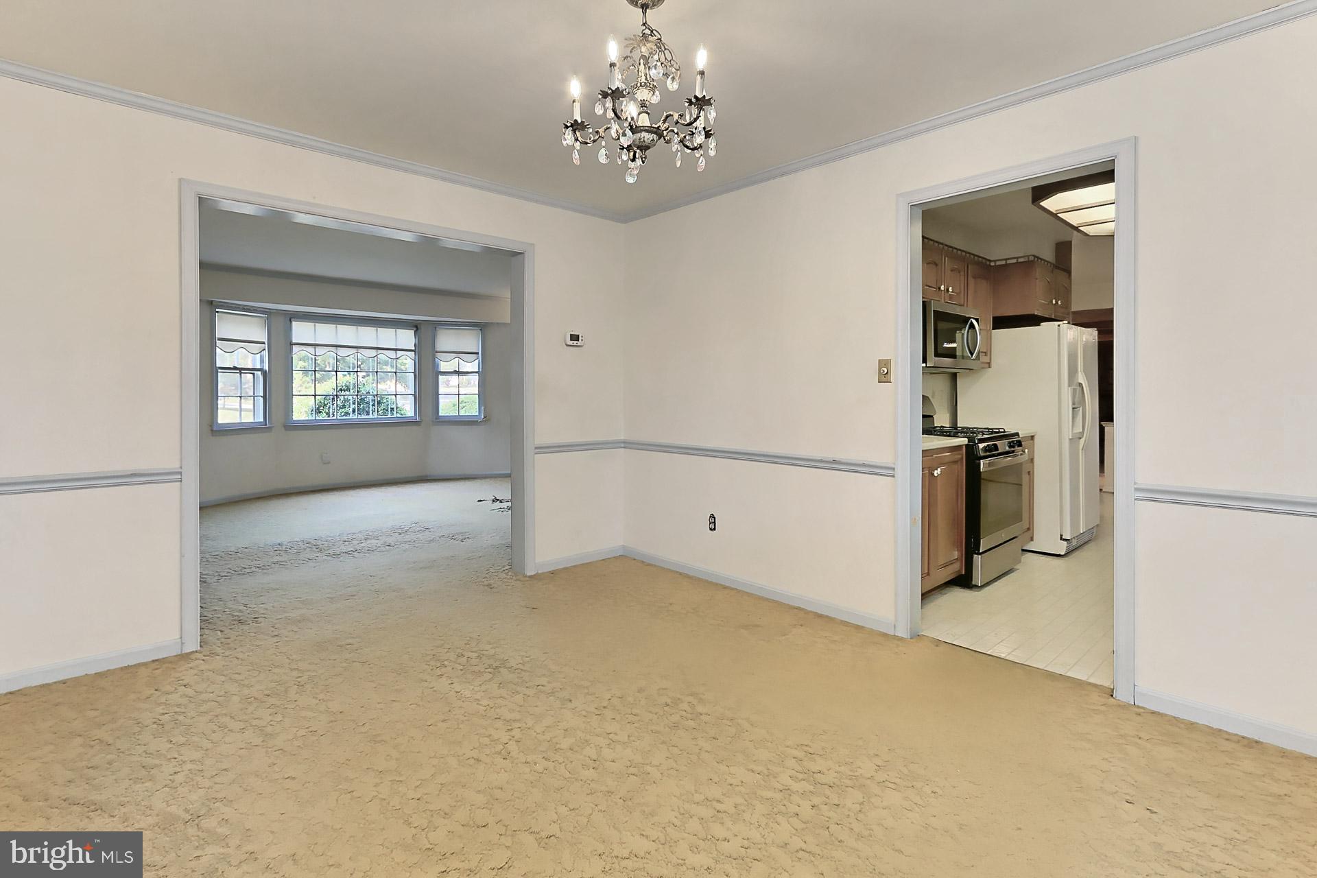 6005 Roxbury Avenue Springfield, VA 22152 - Photo 23 of 45 Dining and Living Rooms