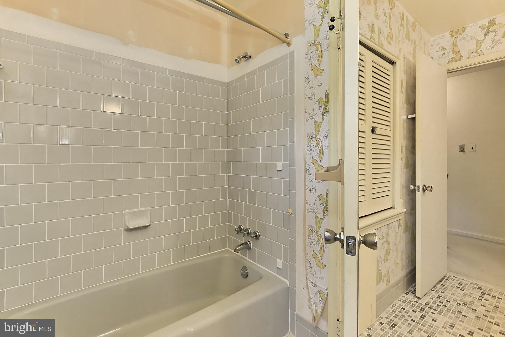 6005 Roxbury Avenue Springfield, VA 22152 - Photo 37 of 45 Tub Shower and Toilet has Privacy Door