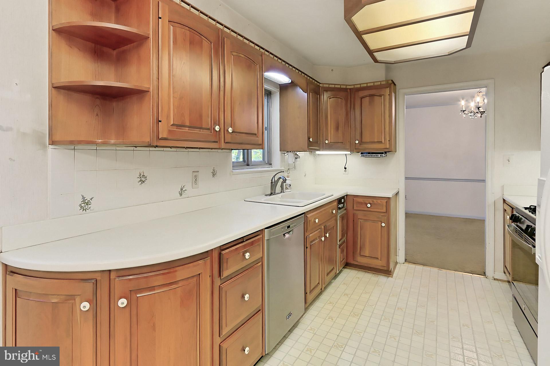 6005 Roxbury Avenue Springfield, VA 22152 - Photo 10 of 45 Nice Wood Cabinets in this Galley Kitchen