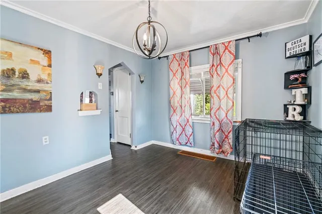 a view of entryway with wooden floor