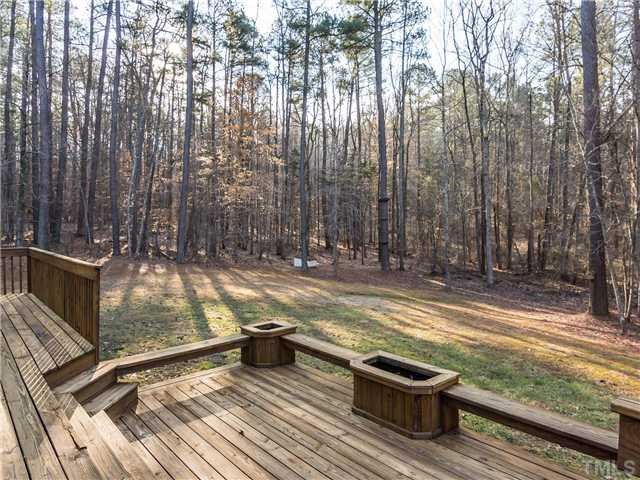 596 Eagle Point Road Pittsboro, NC 27312 - Photo 22 of 25 This deck was made for entertaining! Imagine hosting a cookout here! Patio/Deck