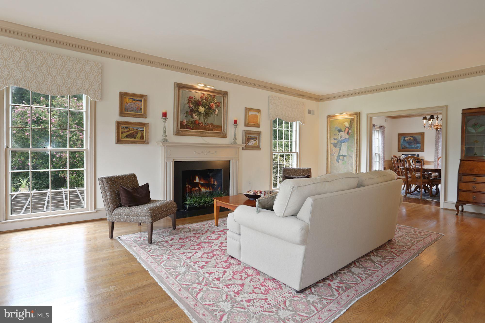 1311 Merrie Ridge Road McLean, VA 22101 - Photo 5 of 54 a living room with furniture and a fireplace