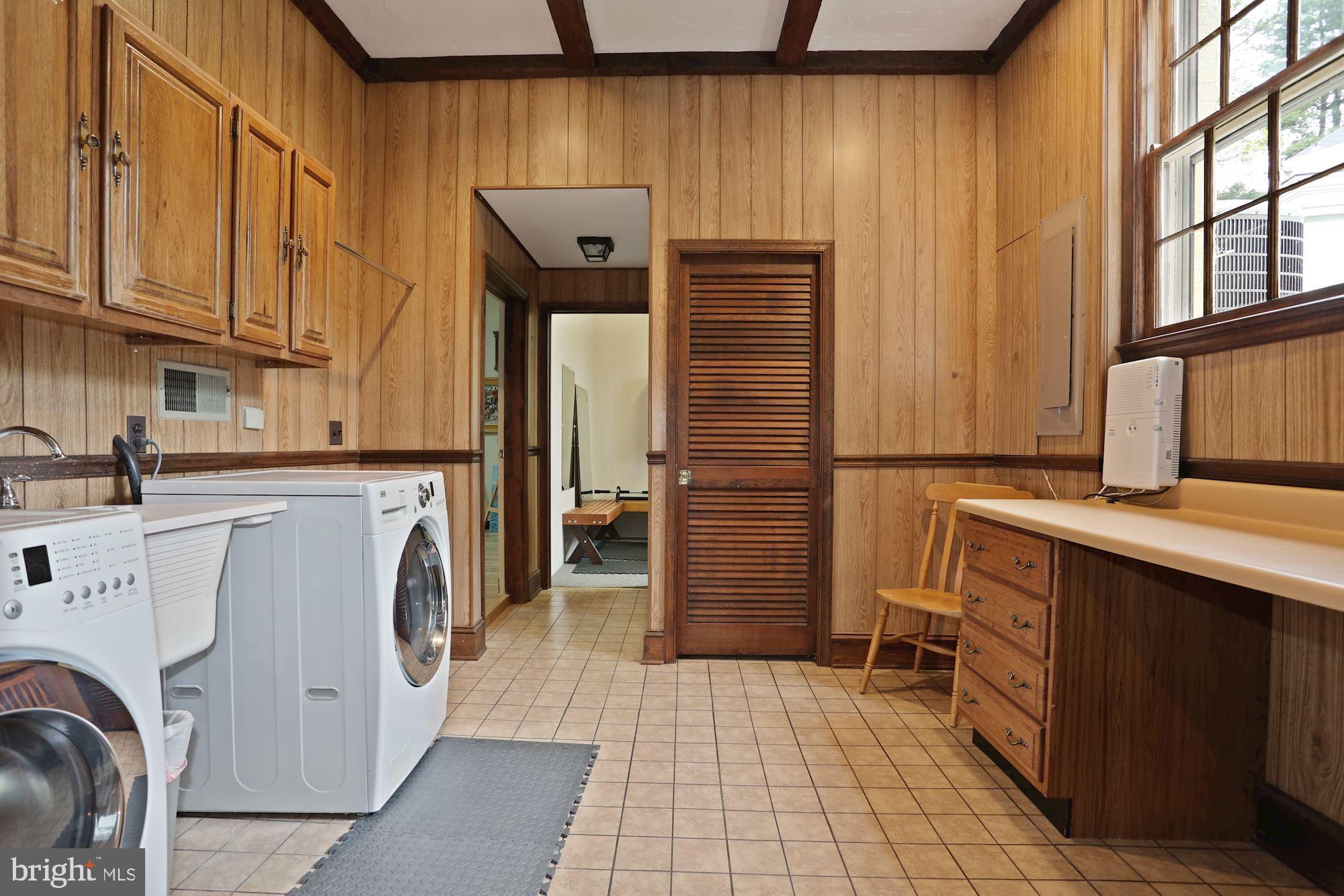 1311 Merrie Ridge Road McLean, VA 22101 - Photo 46 of 54 a utility room with dryer and washer