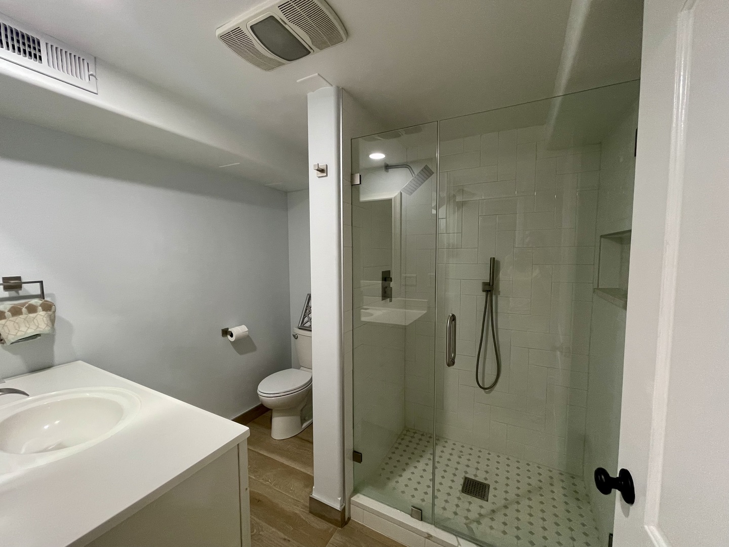 2112 North Sawyer Avenue, Unit I Chicago, IL 60647 - Photo 14 of 30 a bathroom with a shower and a sink