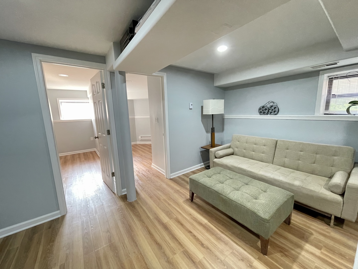 2112 North Sawyer Avenue, Unit I Chicago, IL 60647 - Photo 9 of 30 a living room with furniture and a wooden floor