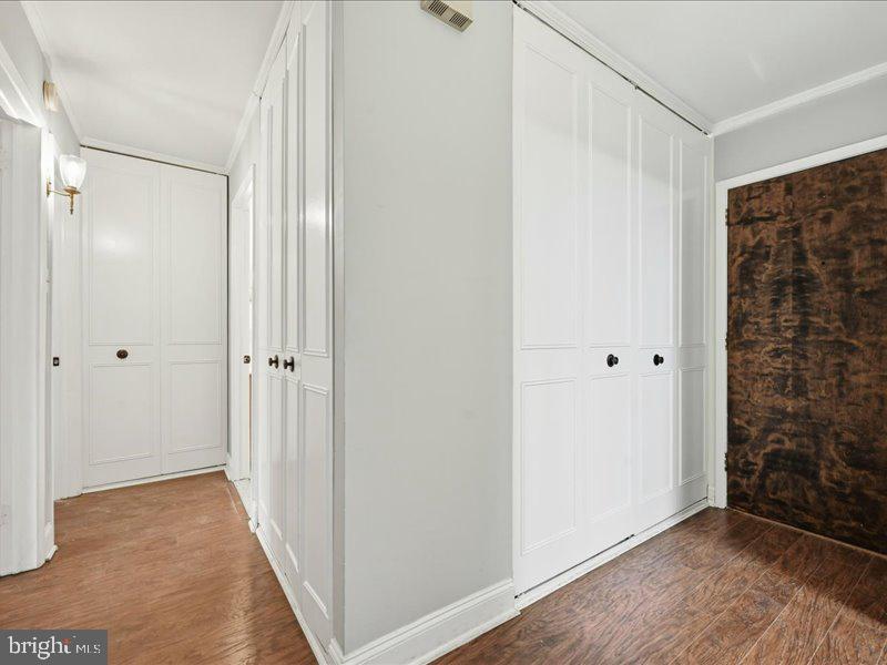 421 Drummers Lane, Unit 421 Wayne, PA 19087 - Photo 13 of 30 a view of a bathroom with wooden floor
