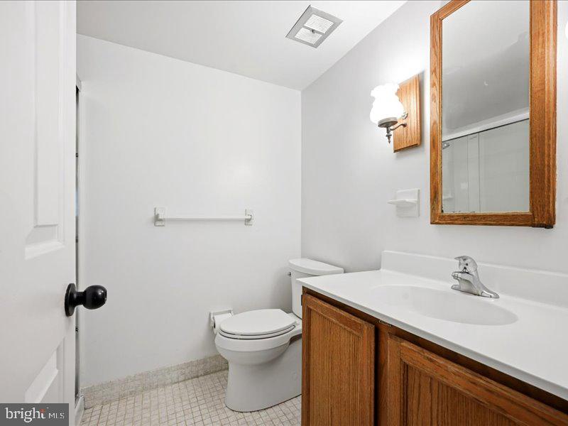 421 Drummers Lane, Unit 421 Wayne, PA 19087 - Photo 26 of 30 a bathroom with a sink and a toilet