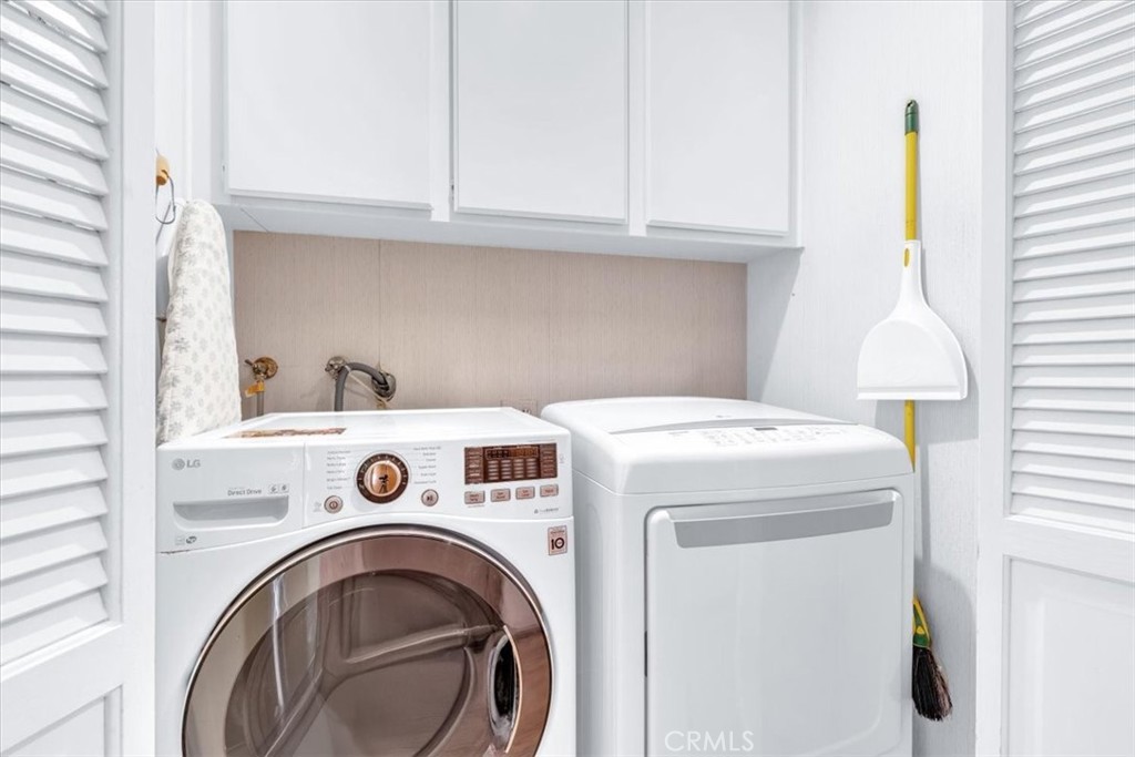 10 St John Dana Point, CA 92629 - Photo 16 of 31 a utility room with dryer and washer