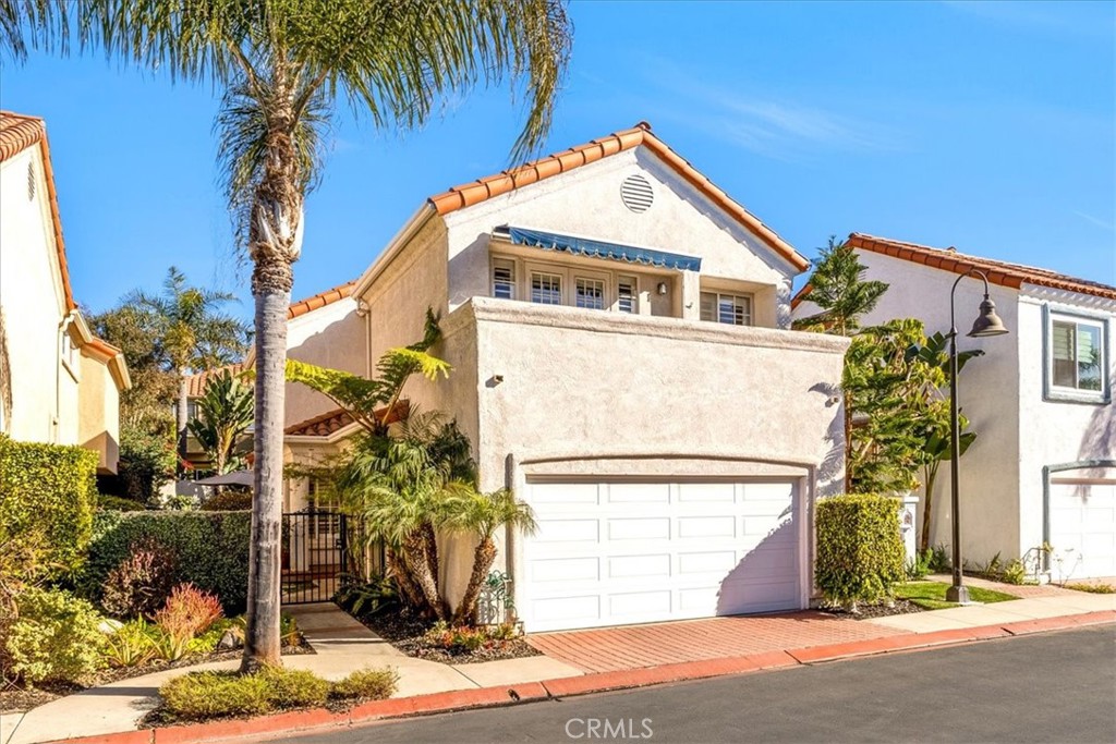 10 St John Dana Point, CA 92629 - Photo 23 of 31 a front view of a house with a yard