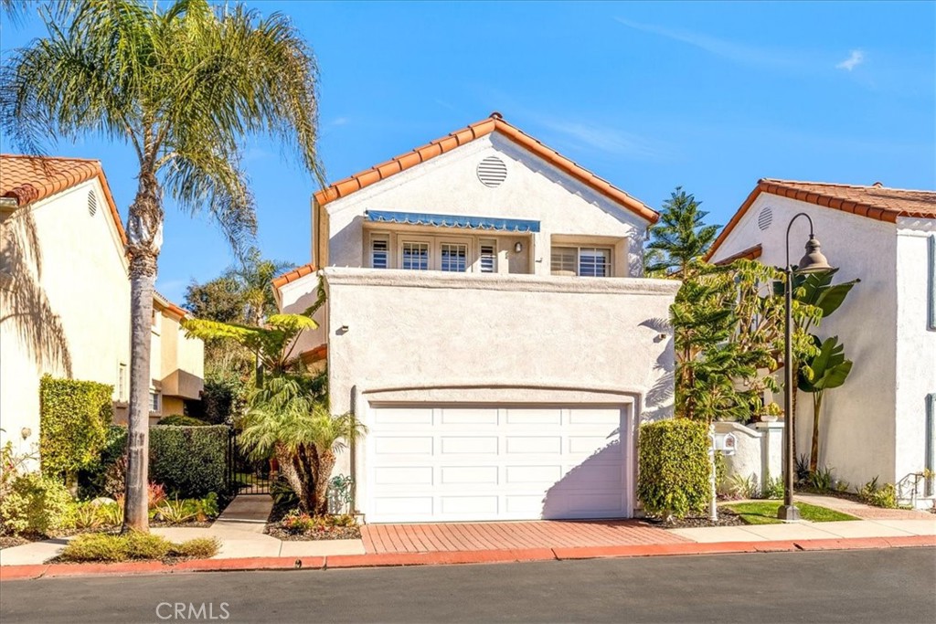 10 St John Dana Point, CA 92629 - Photo 24 of 31 a front view of a house with a yard