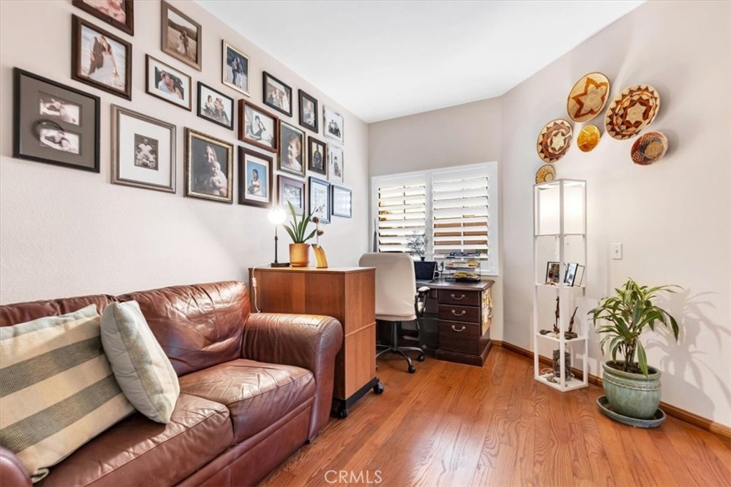 10 St John Dana Point, CA 92629 - Photo 9 of 31 a living room with furniture and wooden floor