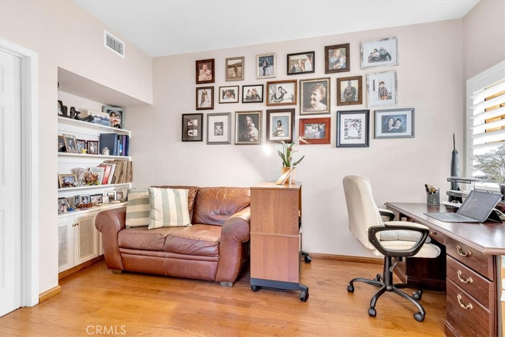 10 St John Dana Point, CA 92629 - Photo 10 of 31 a living room with furniture a rug and a window