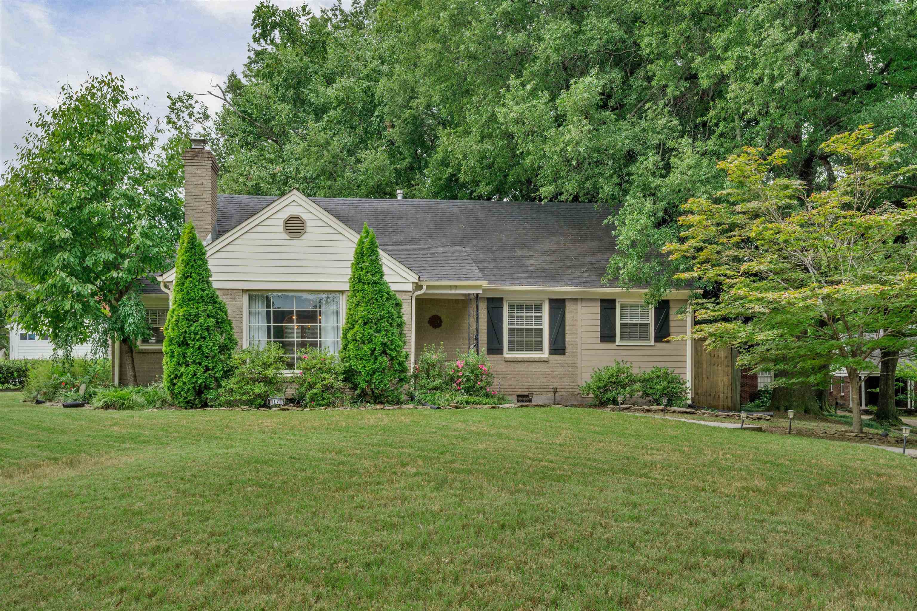 17 North Ashlawn Road Memphis, TN 38112 - Photo 28 of 28 Ranch-style house featuring a front yard, roof with shingles, a chimney, and brick siding