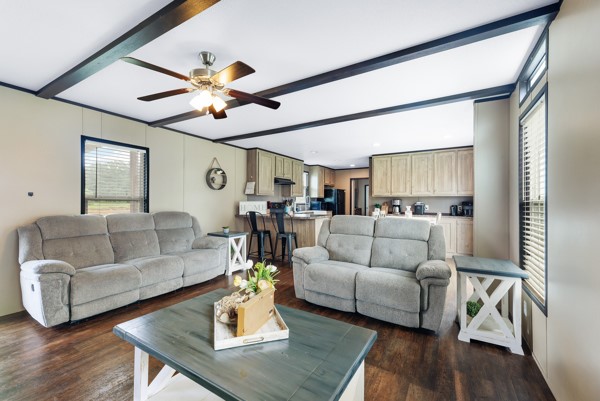 148 A Rogers Road New Waverly, TX 77358 - Photo 12 of 31 a living room with furniture or wooden floor and a chandelier