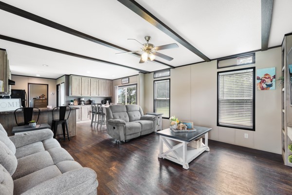 148 A Rogers Road New Waverly, TX 77358 - Photo 2 of 31 a living room with furniture and wooden floor