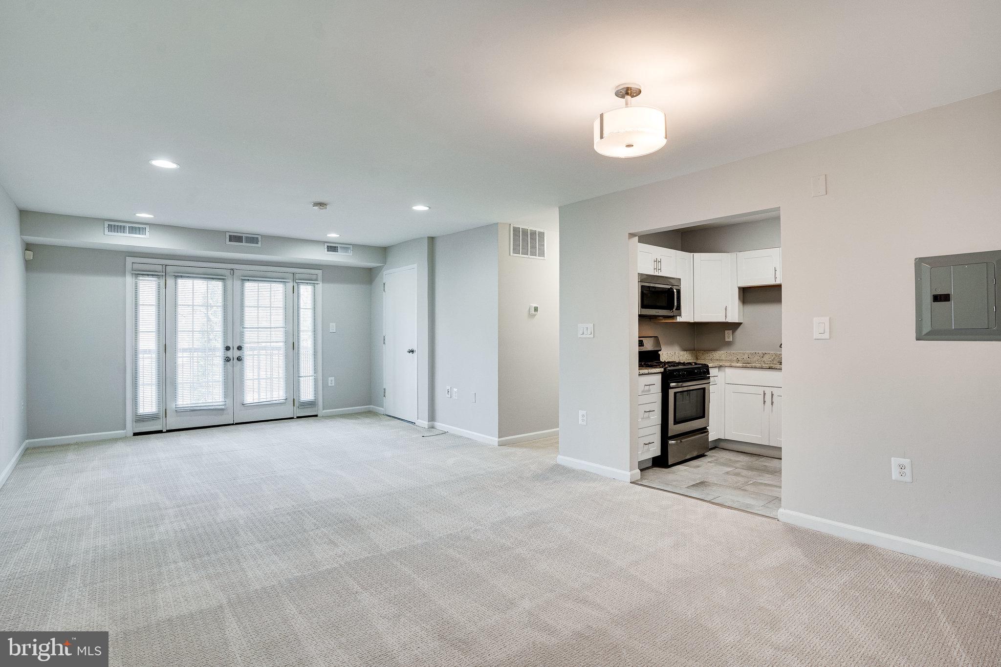 3807 Swann Road, Unit 2 Suitland, MD 20746 - Photo 1 of 20 Living Room/Dining Area